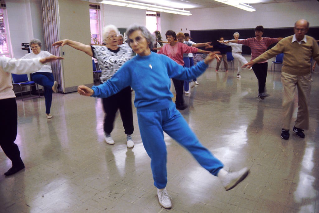 Elderly lady enjoying a dance class