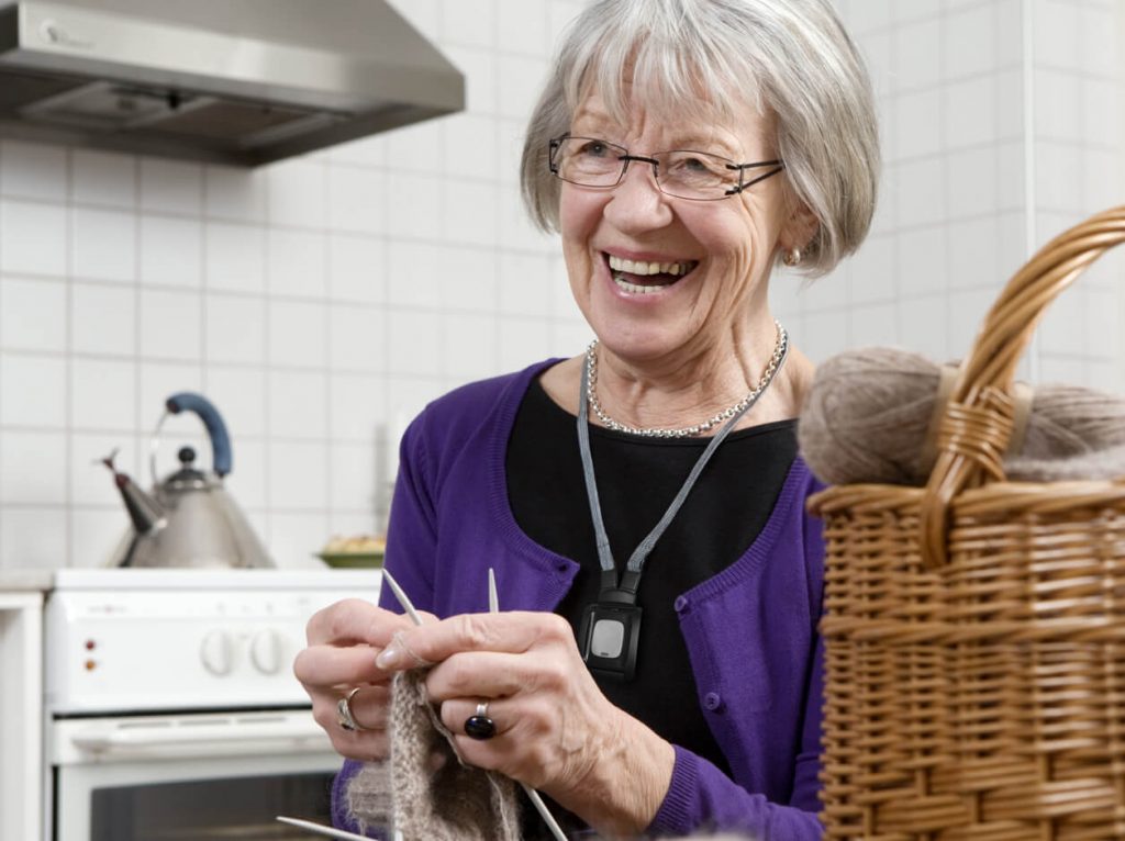 Older lady with the personal alarm pendant